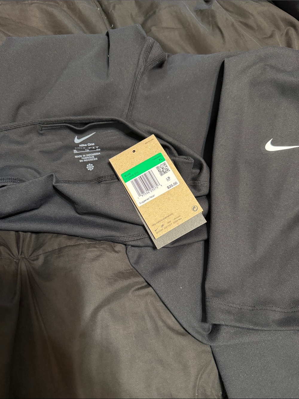 Nike Black Athletic Top with White Swoosh